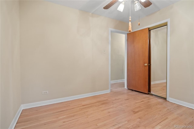 9115 W 5th Ave, Lakewood, CO 80226 - unfurnished bedroom featuring light wood-style floors, a closet, baseboards, and ceiling fan