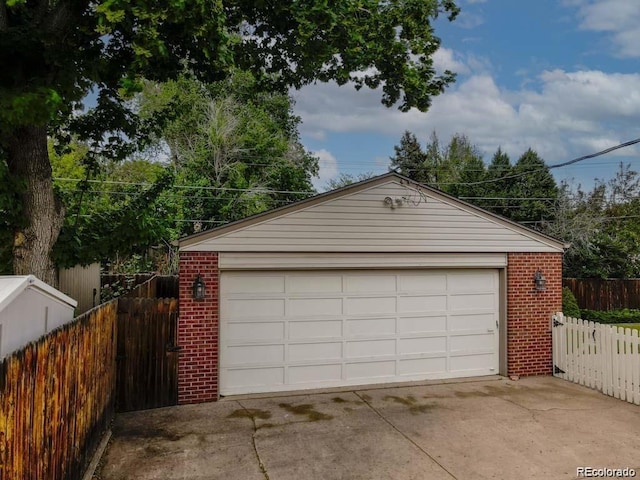 9115 W 5th Ave, Lakewood, CO 80226 - detached garage featuring fence
