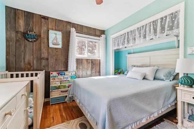 5384 Olde Stage Rd, Boulder, CO 80302 - bedroom featuring wood walls and wood finished floors