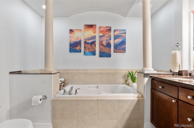1776 Race St Unit 109, Denver, CO 80206 - full bathroom featuring ornate columns, a garden tub, and vanity