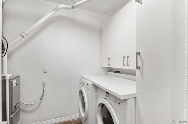 1776 Race St Unit 109, Denver, CO 80206 - laundry room with cabinet space and washer and dryer