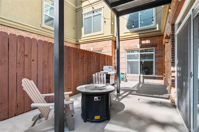 1776 Race St Unit 109, Denver, CO 80206 - view of patio / terrace with an outdoor fire pit