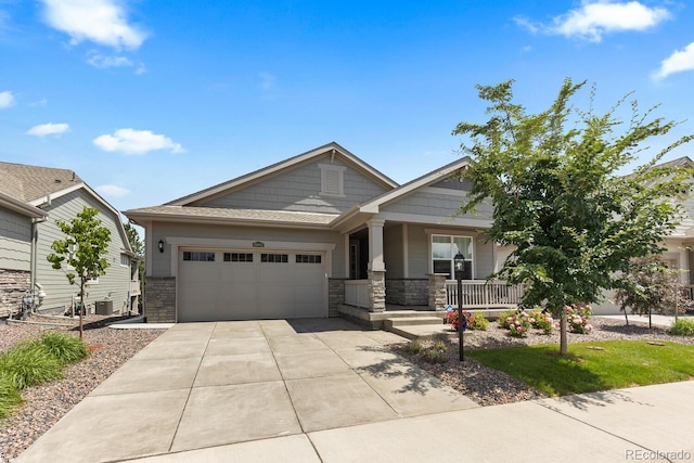15802 Xanthia Way, Thornton, CO 80602 - craftsman inspired home featuring a garage, covered porch, concrete driveway, and stone siding