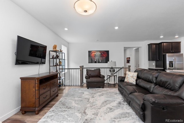 15802 Xanthia Way, Thornton, CO 80602 - living room with light wood finished floors and recessed lighting