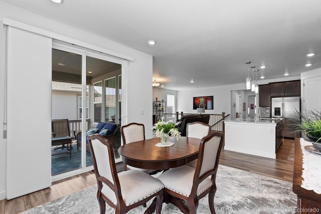 15802 Xanthia Way, Thornton, CO 80602 - dining space with wood finished floors and recessed lighting