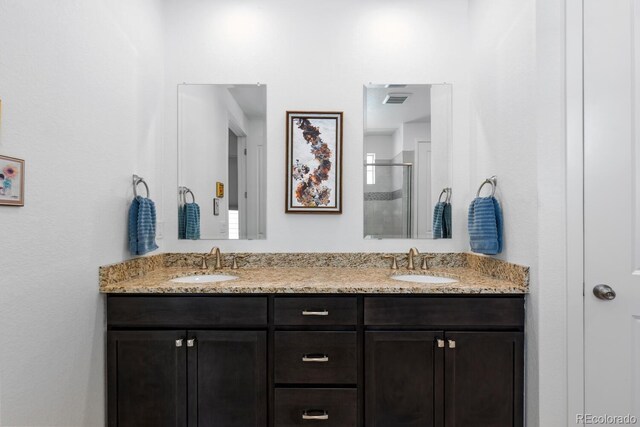 15802 Xanthia Way, Thornton, CO 80602 - full bath featuring double vanity and a stall shower
