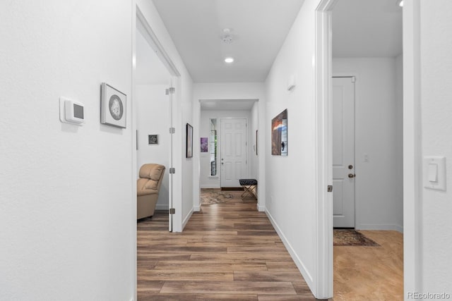 15802 Xanthia Way, Thornton, CO 80602 - corridor with recessed lighting and wood finished floors