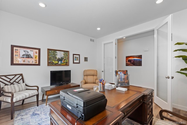 15802 Xanthia Way, Thornton, CO 80602 - home office with light wood-style flooring and recessed lighting