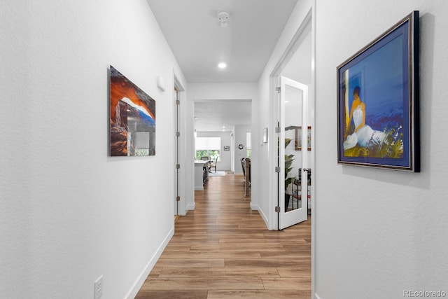 15802 Xanthia Way, Thornton, CO 80602 - hallway with light wood-style flooring and recessed lighting