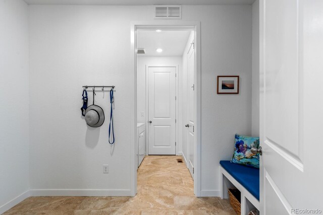 15802 Xanthia Way, Thornton, CO 80602 - washroom with baseboards and washer / dryer