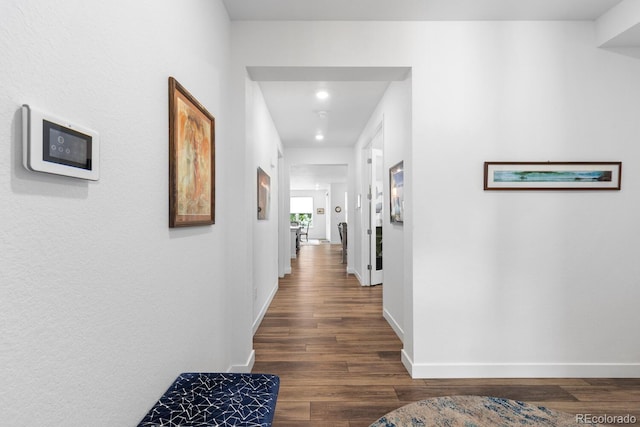 15802 Xanthia Way, Thornton, CO 80602 - hallway with dark wood-style flooring and recessed lighting