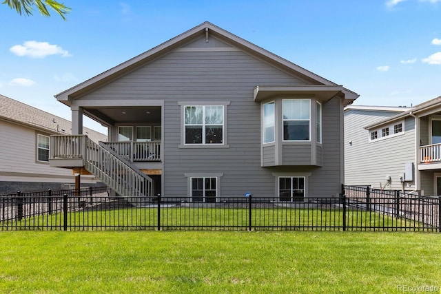 15802 Xanthia Way, Thornton, CO 80602 - rear view of property featuring a fenced backyard and stairs