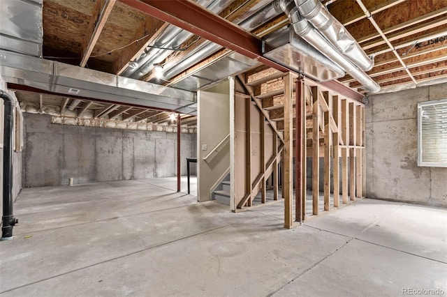 unfinished basement with stairway