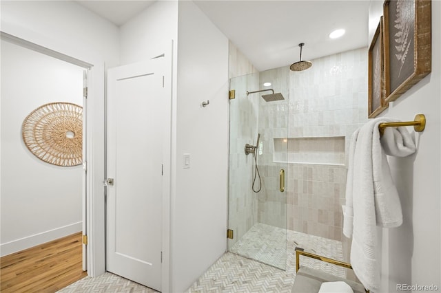 734 N Downing St, Denver, CO 80218 - bathroom with a shower stall, wood finished floors, and recessed lighting