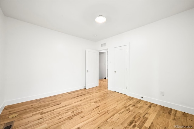 734 N Downing St, Denver, CO 80218 - unfurnished room with light wood-style flooring and baseboards