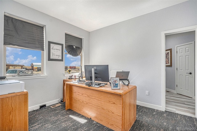 home office with baseboards