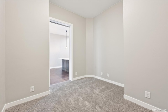 empty room with carpet flooring