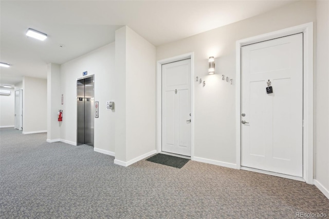 interior space with elevator and dark colored carpet