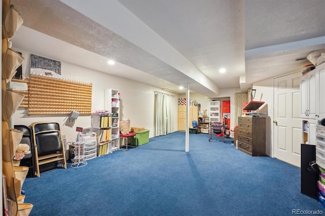 finished below grade area featuring recessed lighting and carpet