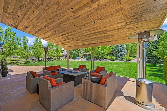 view of patio / terrace featuring an outdoor living space with a fire pit