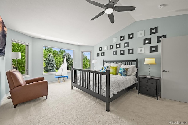 bedroom featuring carpet flooring, multiple windows, ceiling fan, and high vaulted ceiling