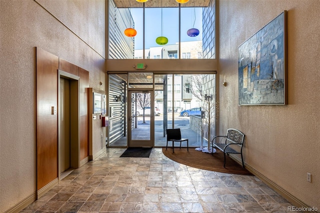 2650 Front Vw Unit 205, Denver, CO 80211 - community lobby with a textured wall and a towering ceiling