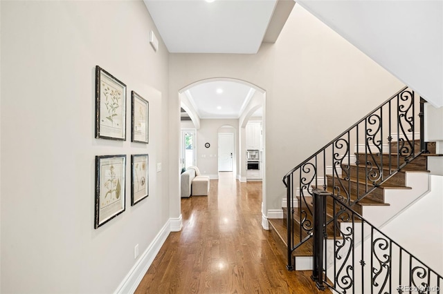 corridor featuring hardwood / wood-style floors