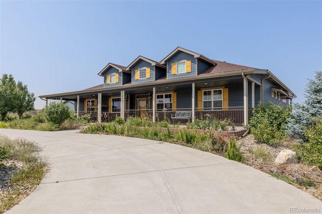 view of front of property featuring covered porch