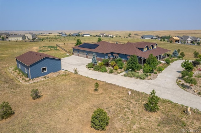 birds eye view of property featuring a rural view