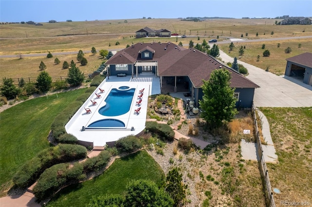 birds eye view of property featuring a rural view