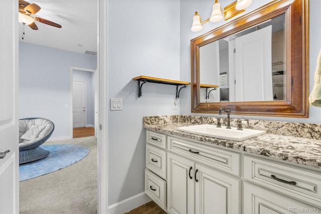 bathroom featuring vanity and ceiling fan