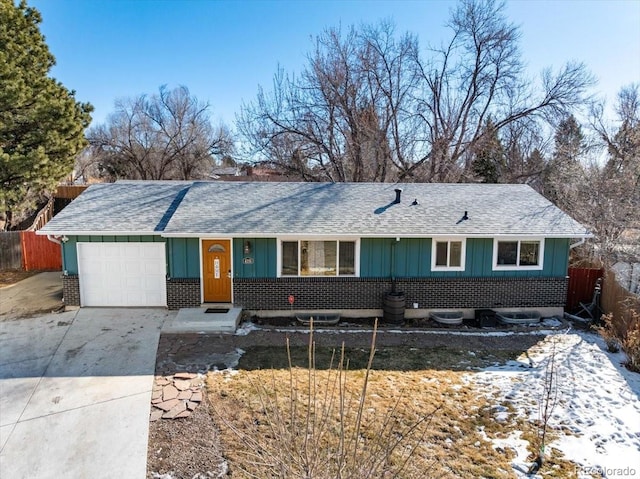 ranch-style house featuring a garage