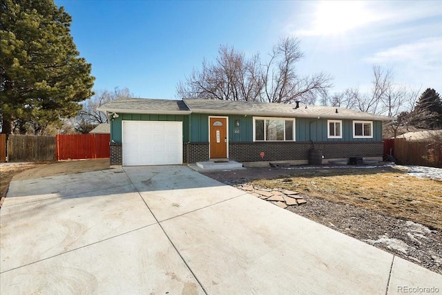 single story home with a garage