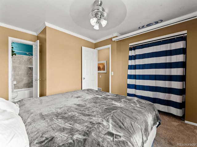 carpeted bedroom featuring a ceiling fan, crown molding, and ensuite bathroom