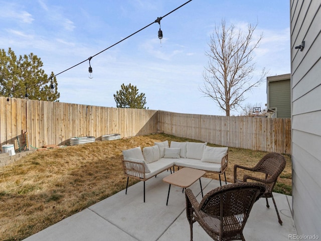 view of patio / terrace featuring outdoor lounge area and a fenced backyard