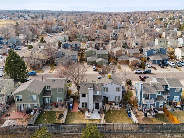 birds eye view of property with a residential view