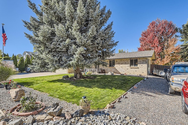 view of front of property with a front lawn