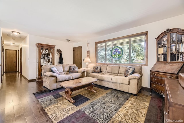 living room featuring dark hardwood / wood-style floors