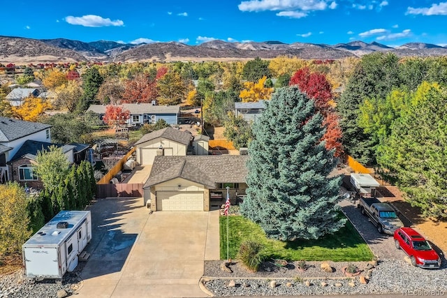 drone / aerial view featuring a mountain view