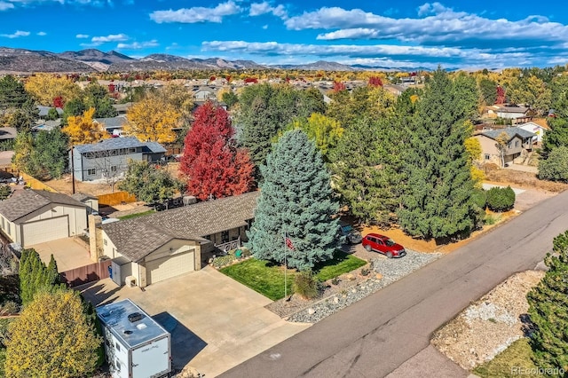 drone / aerial view featuring a mountain view