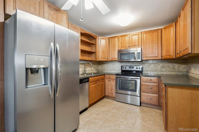 725 S Alton Way Unit 7D, Denver, CO 80247 - kitchen featuring stainless steel appliances, a ceiling fan, dark countertops, open shelves, and backsplash