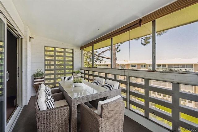 725 S Alton Way Unit 7D, Denver, CO 80247 - sunroom featuring vaulted ceiling and outdoor dining area