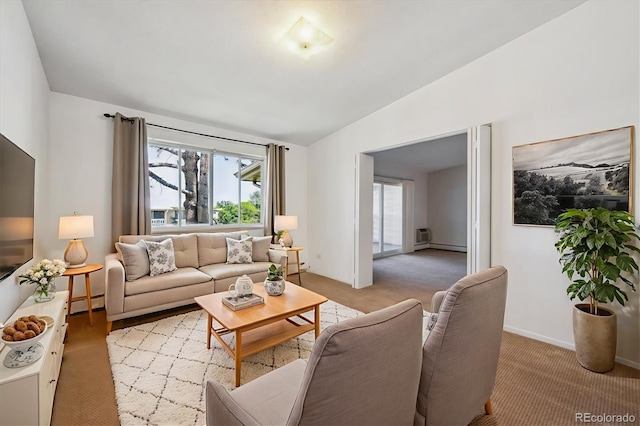 725 S Alton Way Unit 7D, Denver, CO 80247 - living area with vaulted ceiling, light colored carpet, and baseboard heating