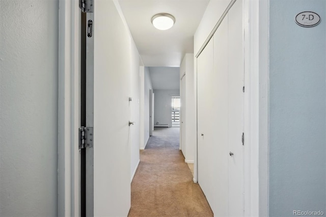 725 S Alton Way Unit 7D, Denver, CO 80247 - hallway featuring light carpet