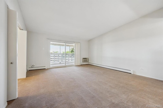 725 S Alton Way Unit 7D, Denver, CO 80247 - empty room with baseboard heating, carpet, and lofted ceiling