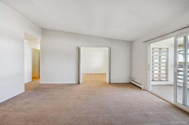 725 S Alton Way Unit 7D, Denver, CO 80247 - empty room with a baseboard radiator and carpet floors