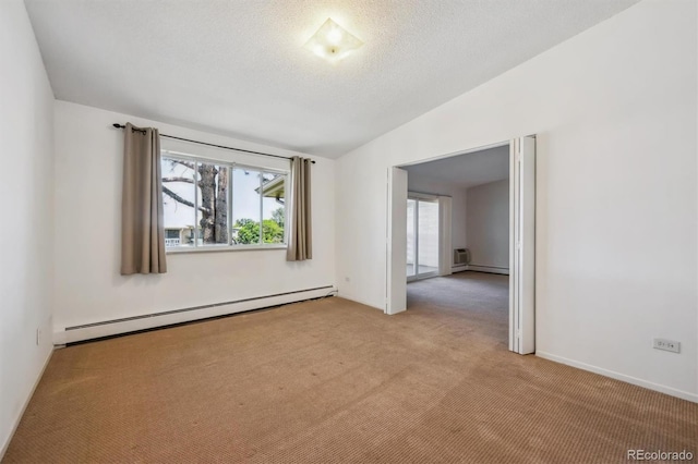 725 S Alton Way Unit 7D, Denver, CO 80247 - carpeted spare room featuring baseboard heating and lofted ceiling