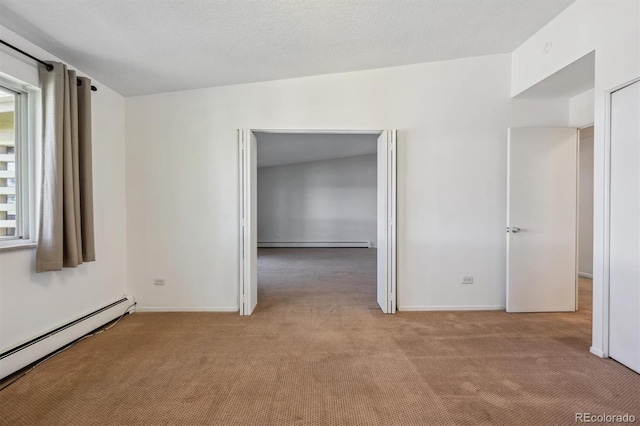 725 S Alton Way Unit 7D, Denver, CO 80247 - carpeted empty room with a baseboard heating unit and baseboard heating