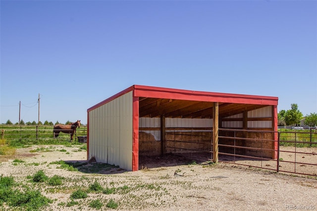 view of outbuilding featuring a rural view