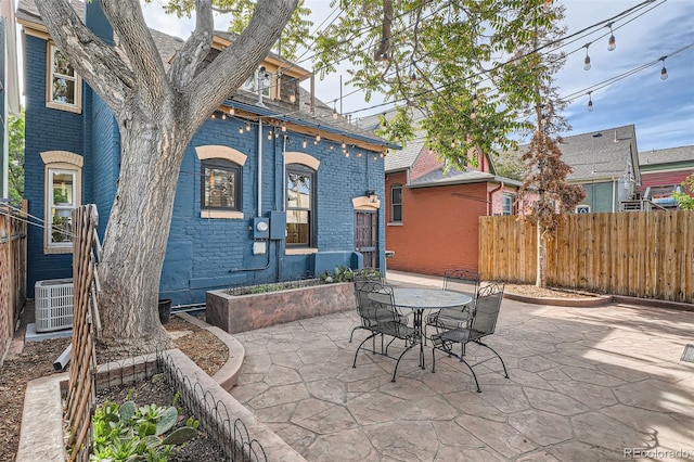 209 S Lincoln St, Denver, CO 80209 - view of patio with central air condition unit and outdoor dining area